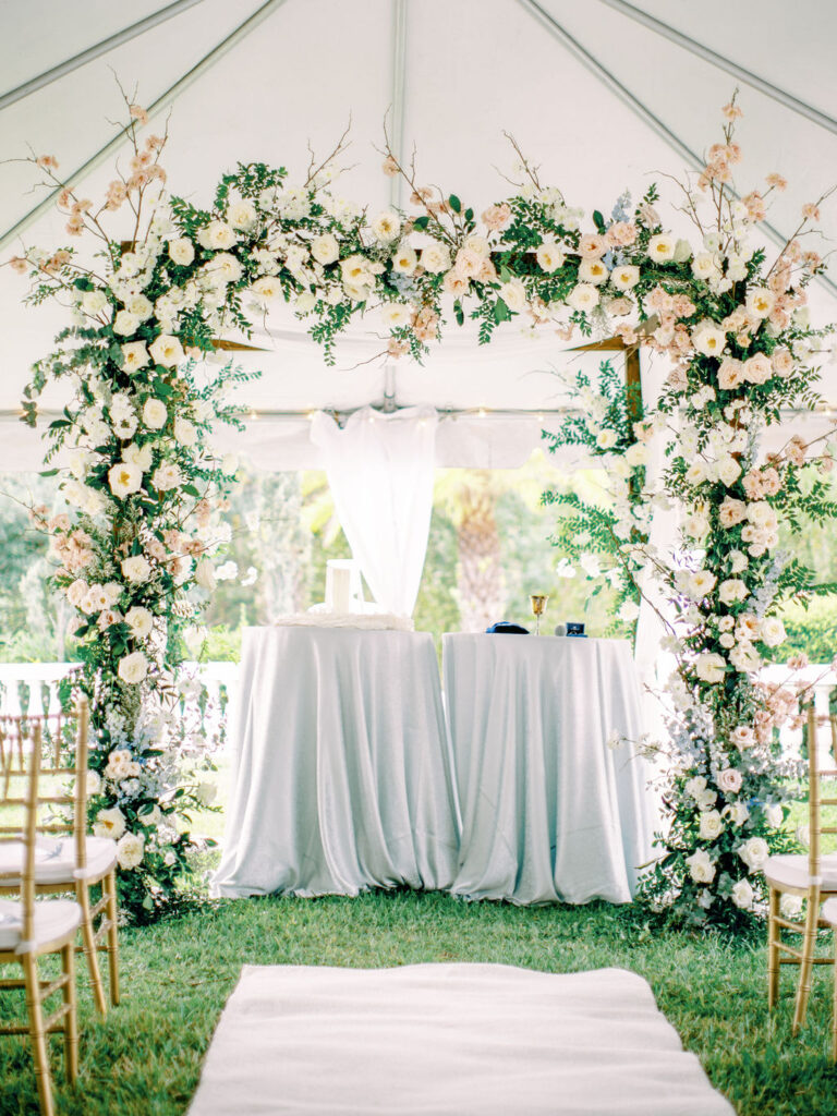 Floral Design by Floral Symphony in a Spring Wedding at La Casa Toscana by Blush & White captured by Tiffany Von Photography